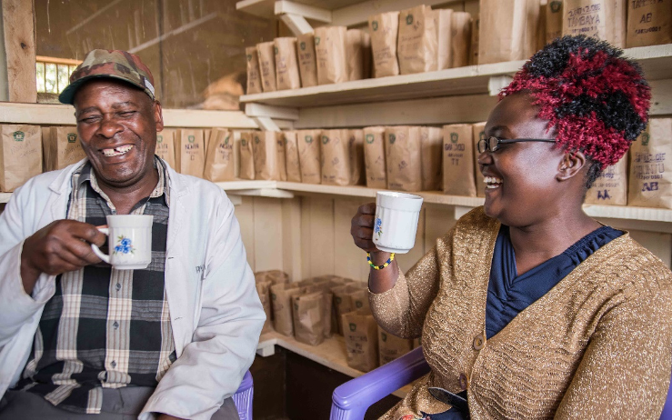 Coffee tasters enjoying a cup of coffee at Rumukia coffee dry mill © Roshni Lodhia